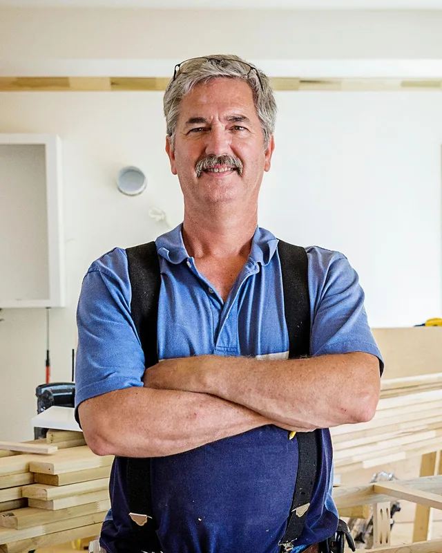 Bobby Cooper, retired window replacement professional, at a job site